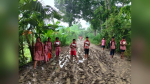 ২৯ বছরেও পাকা হয়নি স্কুলে যাওয়ার রাস্তা, কাদাপানি মাড়িয়ে শিক্ষার্থীদের যাতায়াত